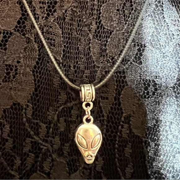 Planetary Visitor Alien Head Necklace on a Black Cord with Saturn Charm ending - Picture 8 of 10